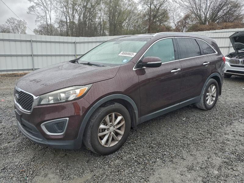 KIA SORENTO LX 2016 with VIN 5XYPG4A50GG016585 - Photo from auction