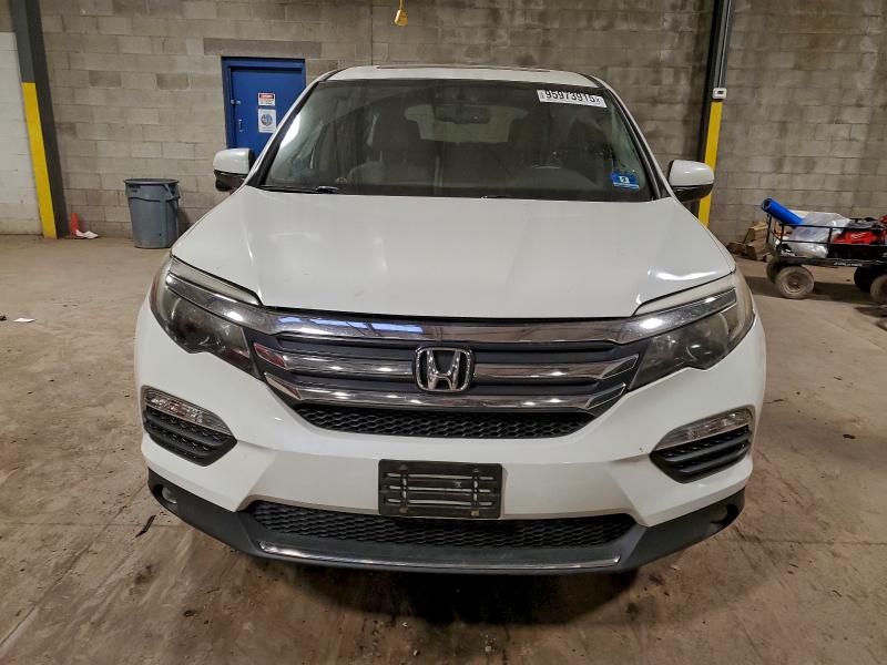 Photo 5 from auction – 2016 HONDA PILOT EXL with VIN 5FNYF6H55GB066284