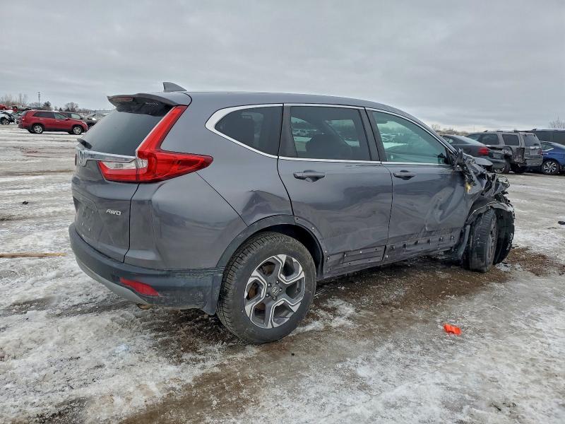 Photo 3 from auction – 2018 HONDA CR-V EXL with VIN 7FARW2H80JE101784