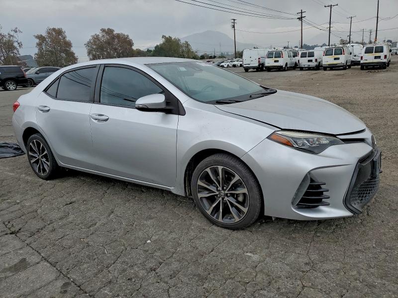 Photo 4 from auction – 2018 TOYOTA COROLLA L with VIN 5YFBURHEXJP765824