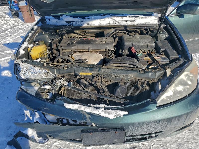 Photo 11 from auction – 2002 TOYOTA CAMRY with VIN JTDBE30K220069966