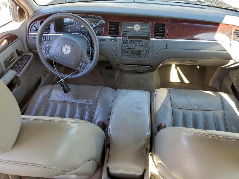 Photo 8 from auction – 2004 LINCOLN TOWN CAR E with VIN 1LNHM81W34Y682125
