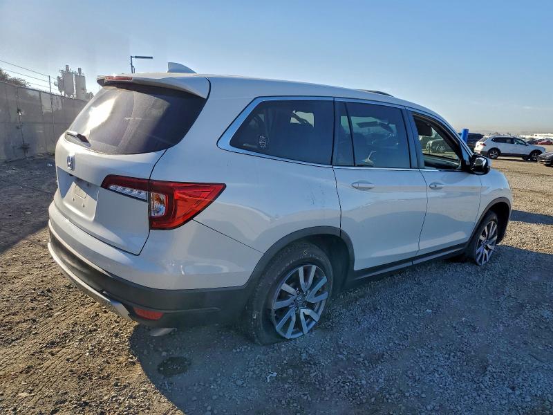 Photo 3 from auction – 2021 HONDA PILOT EXL with VIN 5FNYF5H5XMB040057