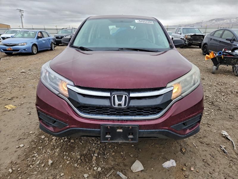 Photo 5 from auction – 2015 HONDA CR-V LX with VIN 2HKRM3H33FH538585