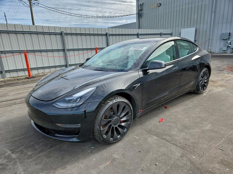 TESLA MODEL 3 2022 with VIN 5YJ3E1EC2NF354456 - Photo from auction