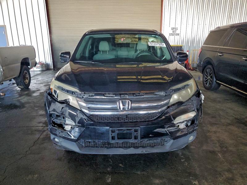 Photo 5 from auction – 2016 HONDA PILOT EX with VIN 5FNYF5H3XGB023150