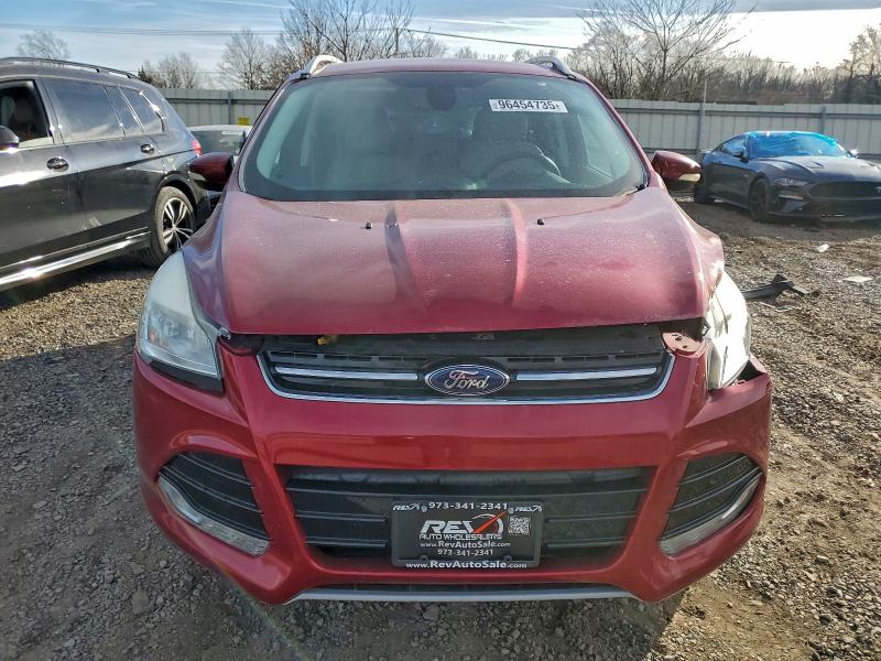 Photo 5 from auction – 2015 FORD ESCAPE with VIN 1FMCU9JX5FUA38807