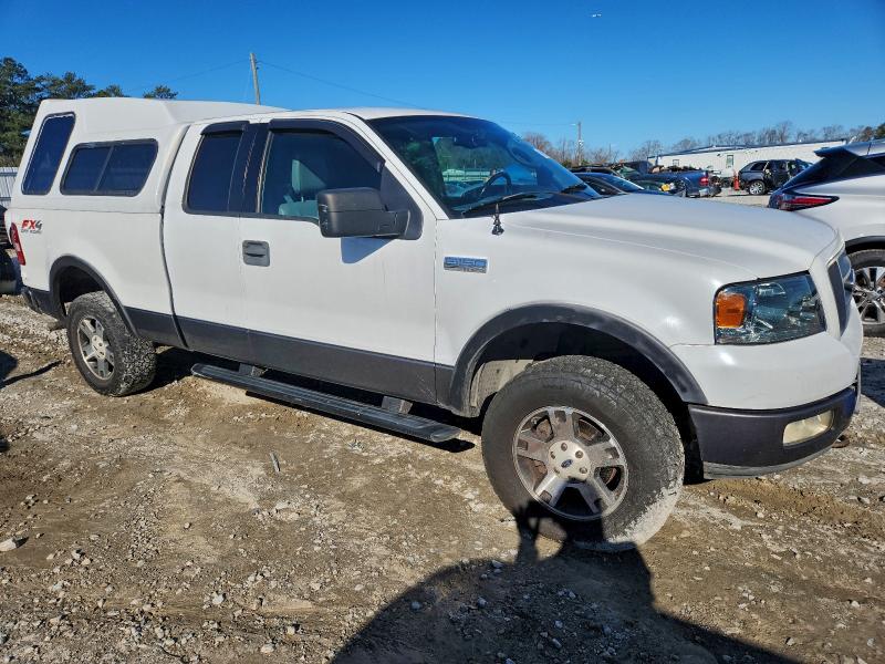 Photo 4 from auction – 2004 FORD F150 with VIN 1FTPX14574NA86924
