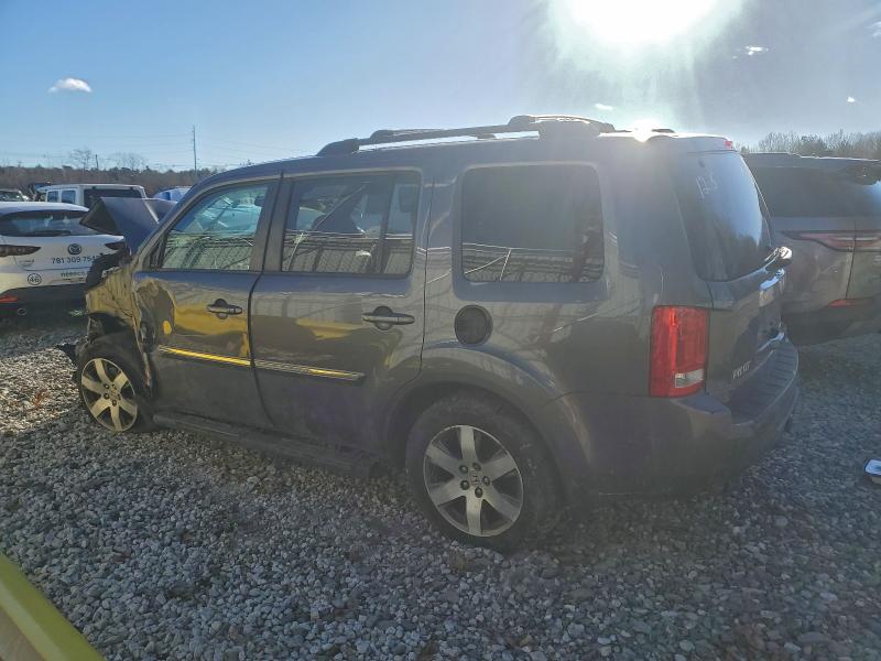 Photo 2 from auction – 2014 HONDA PILOT TOUR with VIN 5FNYF4H94EB052090
