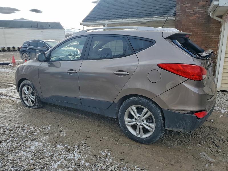 Photo 2 from auction – 2011 HYUNDAI TUCSON GLS with VIN KM8JUCAC1BU226915