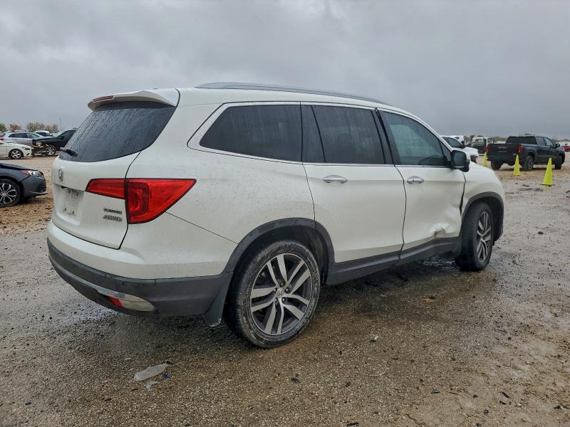 Фото 3 с аукциона – 2016 HONDA PILOT с VIN 5FNYF6H95GB039427