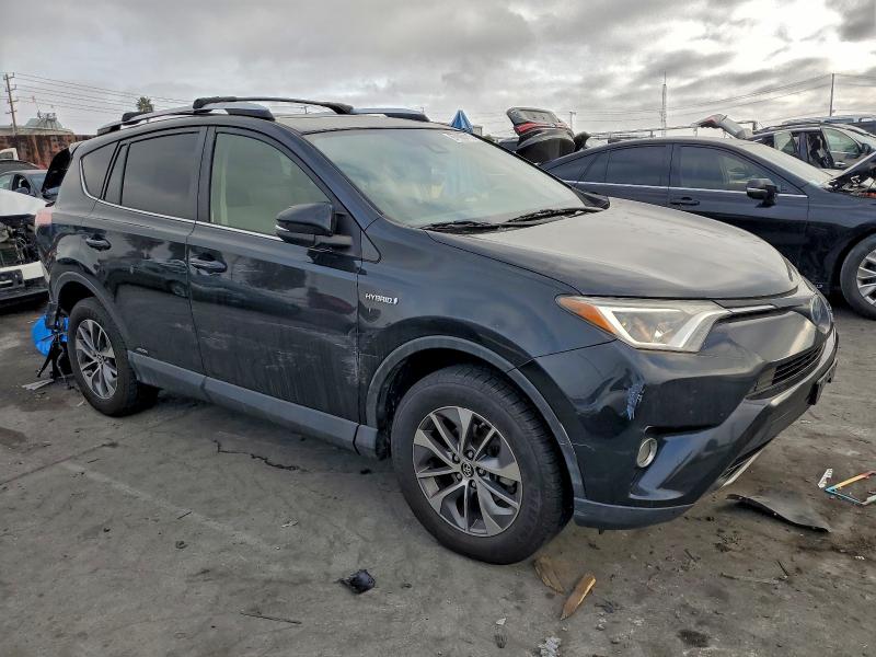 Photo 4 from auction – 2017 TOYOTA RAV4 HV LE with VIN JTMRJREV0HD059762
