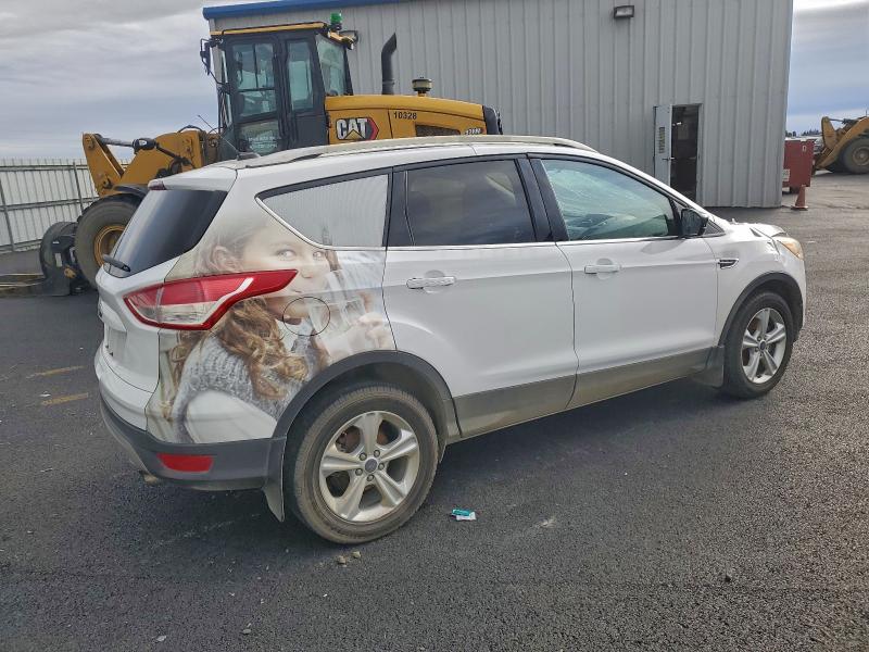 Photo 3 from auction – 2016 FORD ESCAPE SE with VIN 1FMCU9G95GUC82208
