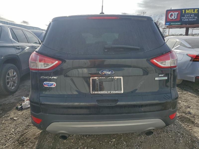 Photo 6 from auction – 2015 FORD ESCAPE SE with VIN 1FMCU0G9XFUA32098