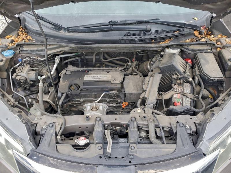 Photo 12 from auction – 2015 HONDA CR-V LX with VIN 2HKRM4H30FH609134