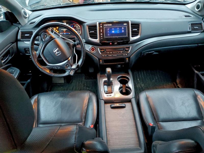 Photo 8 from auction – 2017 HONDA RIDGELINE with VIN 5FPYK3F61HB004086