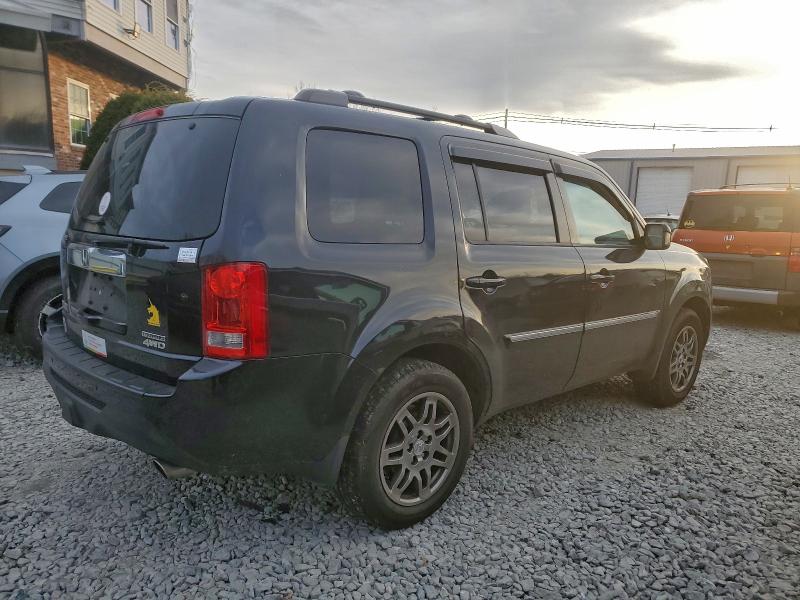 Photo 3 from auction – 2013 HONDA PILOT TOUR with VIN 5FNYF4H9XDB053565