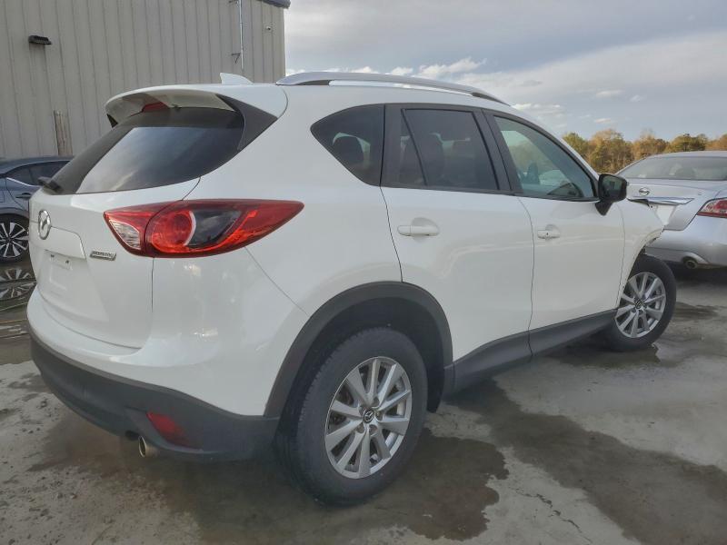 Photo 3 from auction – 2015 MAZDA CX-5 TOURI with VIN JM3KE2CY0F0541024