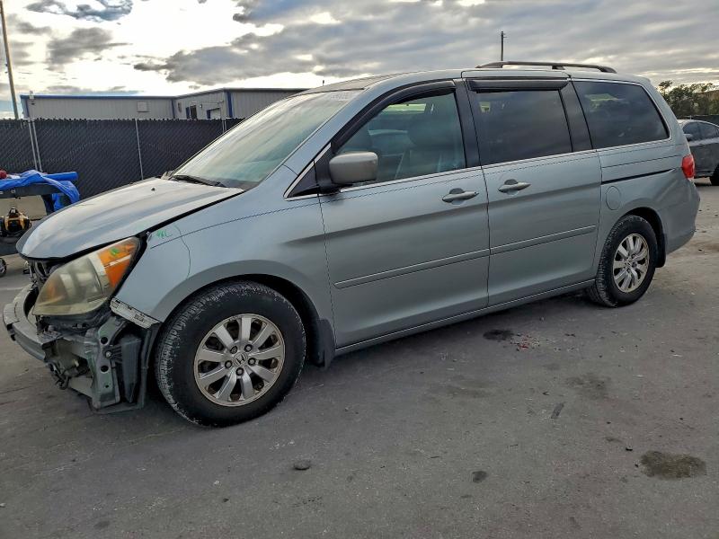 HONDA ODYSSEY EX 2010 with VIN 5FNRL3H62AB044383 - Photo from auction