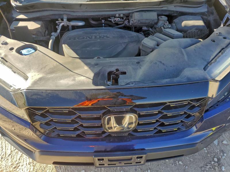 Photo 11 from auction – 2023 HONDA PASSPORT E with VIN 5FNYF8H03PB017939
