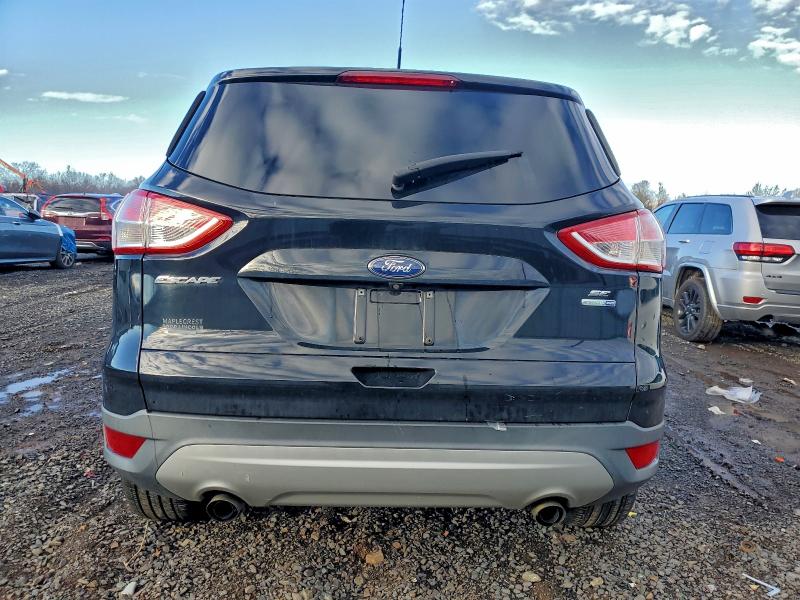 Photo 6 from auction – 2016 FORD ESCAPE SE with VIN 1FMCU9GX2GUB31583