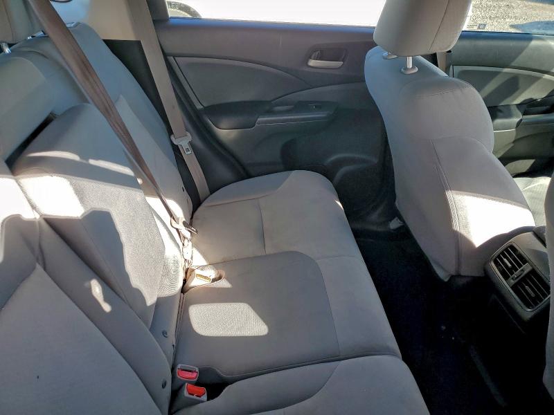 Photo 11 from auction – 2016 HONDA CR-V LX with VIN 5J6RM3H31GL027822