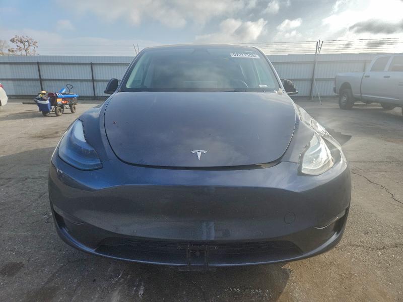 Photo 5 from auction – 2022 TESLA MODEL Y with VIN 7SAYGDEE6NF521519
