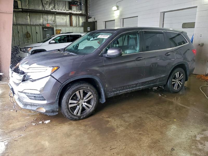 HONDA PILOT EXL 2018 with VIN 5FNYF6H52JB057145 - Photo from auction