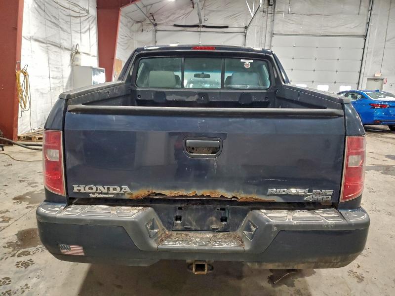Photo 6 from auction – 2010 HONDA RIDGELINE with VIN 5FPYK1F20AB003289