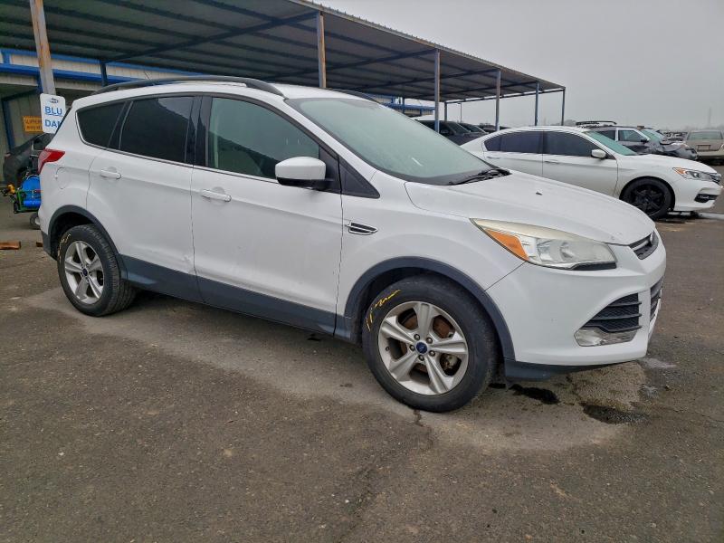 Photo 4 from auction – 2016 FORD ESCAPE SE with VIN 1FMCU0GX3GUA99836