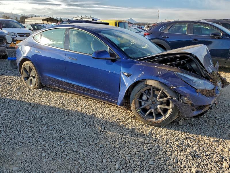 Photo 4 from auction – 2022 TESLA MODEL 3 with VIN 5YJ3E1EBXNF253320