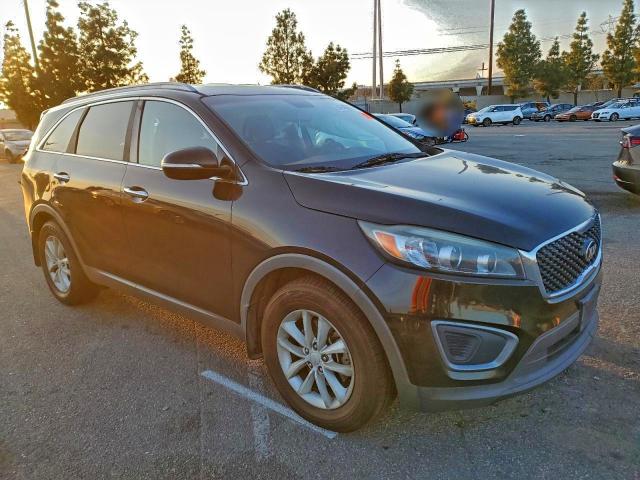 Photo 4 from auction – 2016 KIA SORENTO LX with VIN 5XYPG4A56GG153207