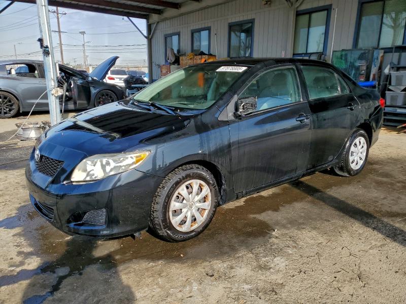 TOYOTA COROLLA 2010 with VIN 1NXBU4EE1AZ299657 - Photo from auction