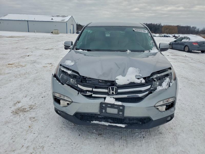 Photo 5 from auction – 2018 HONDA PILOT EX with VIN 5FNYF6H30JB020433