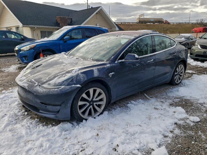 TESLA MODEL 3 2018 with VIN 5YJ3E1EB2JF104104 - Photo from auction