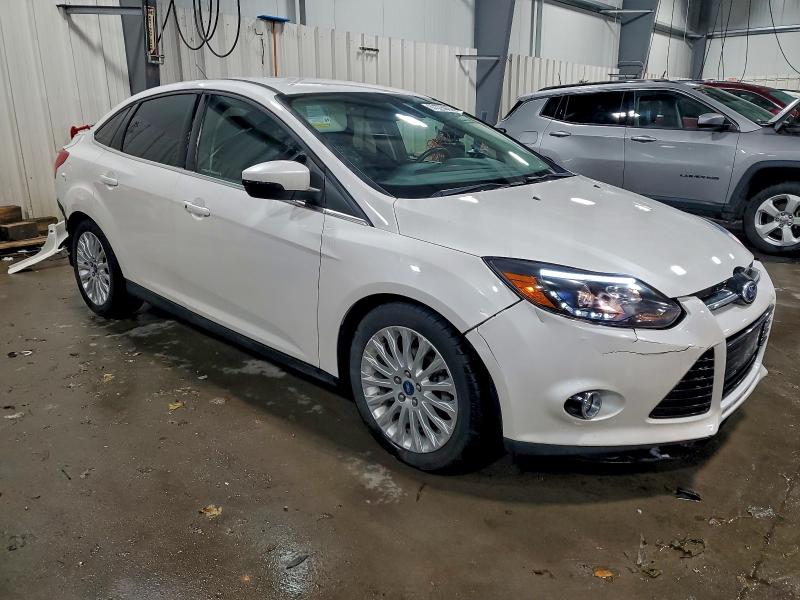 Photo 4 from auction – 2012 FORD FOCUS TITA with VIN 1FAHP3J28CL451380