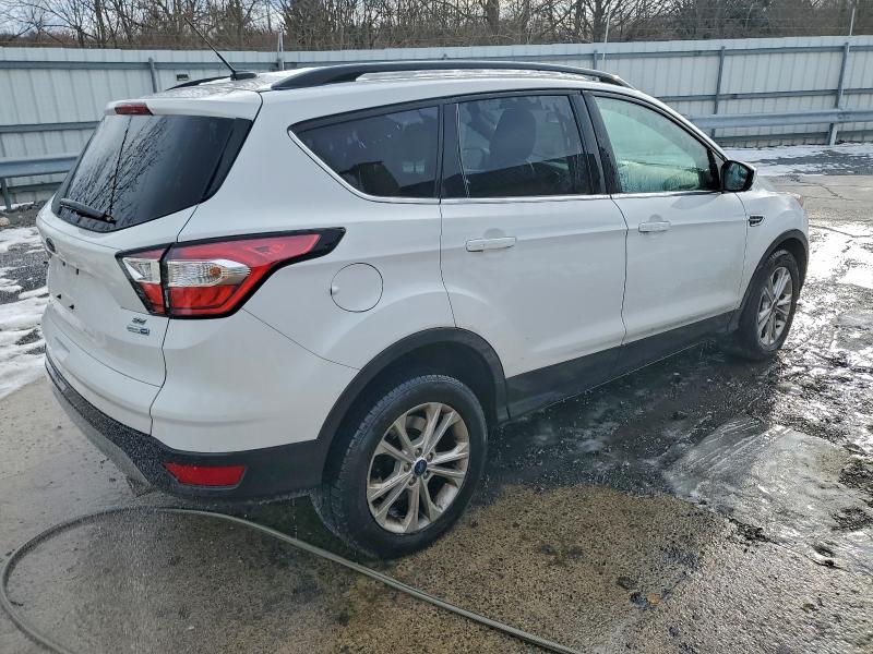 Photo 3 from auction – 2018 FORD ESCAPE SE with VIN 1FMCU9GD6JUC76977