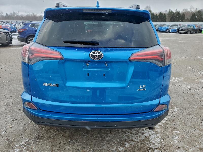 Photo 6 from auction – 2016 TOYOTA RAV4 LE with VIN JTMBFREV3GD197328