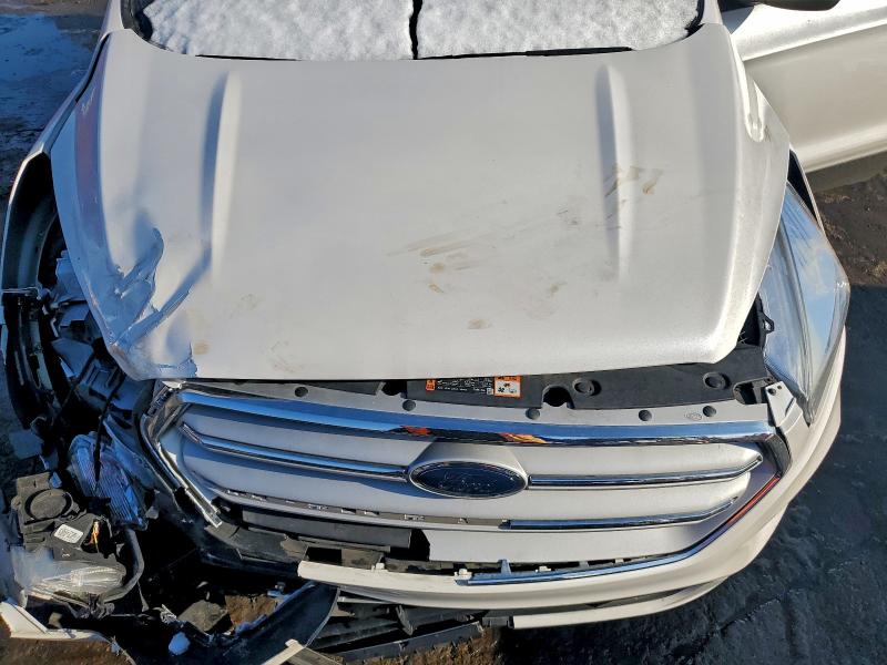 Photo 12 from auction – 2019 FORD ESCAPE with VIN 1FMCU9GD3KUC57644