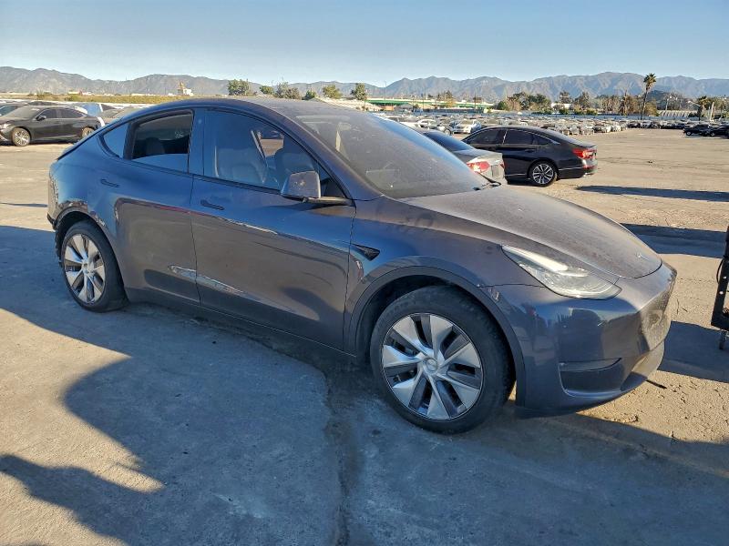 Photo 4 from auction – 2023 TESLA MODEL Y with VIN 7SAYGDEE2PA099412