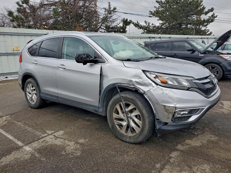 Photo 4 from auction – 2016 HONDA CR-V EXL with VIN 2HKRM4H79GH719359