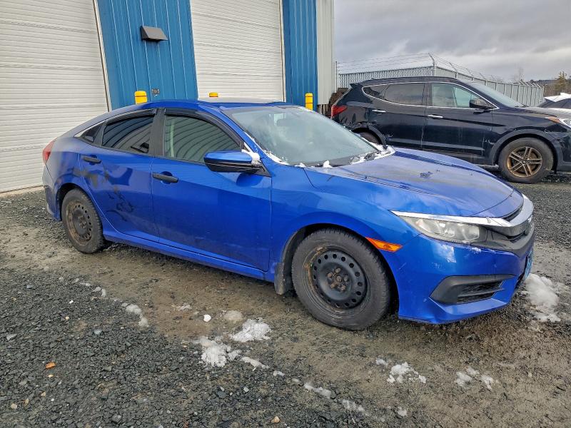 Photo 4 from auction – 2017 HONDA CIVIC LX with VIN 2HGFC2F53HH014614