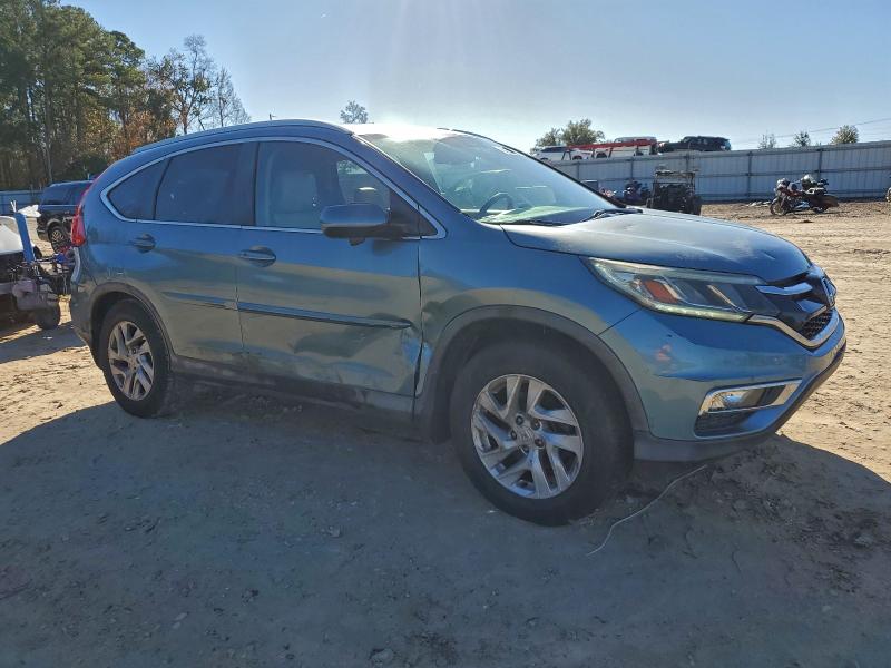 Photo 4 from auction – 2015 HONDA CR-V EXL with VIN 2HKRM3H73FH522535