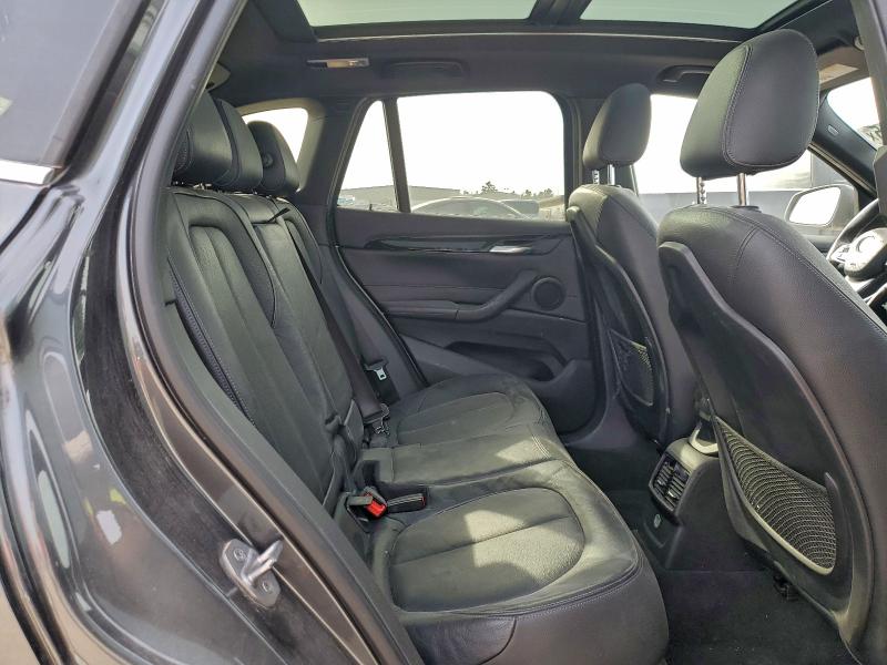 Photo 11 from auction – 2016 BMW X1 with VIN WBXHT3C37GP884895
