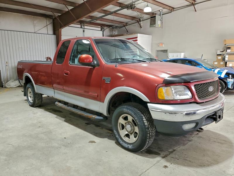 Photo 4 from auction – 2000 FORD F 150 with VIN 1FTRX18L3YNA78472