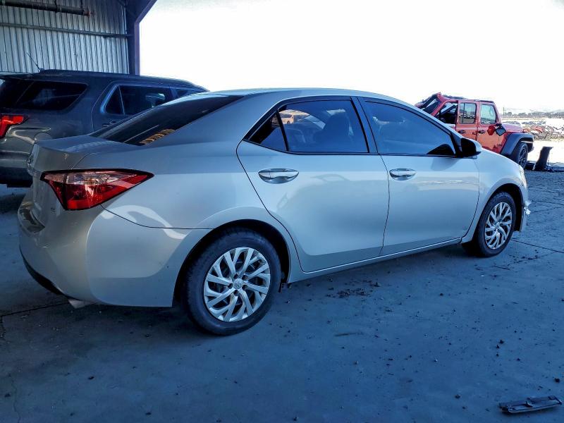 Photo 3 from auction – 2018 TOYOTA COROLLA L with VIN 5YFBURHE1JP844718