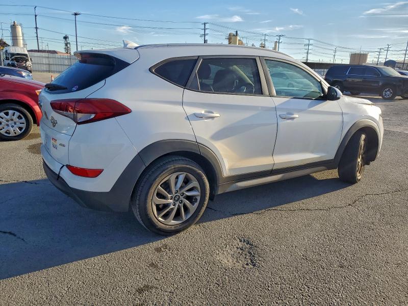 Photo 3 from auction – 2018 HYUNDAI TUCSON with VIN KM8J3CA42JU769720