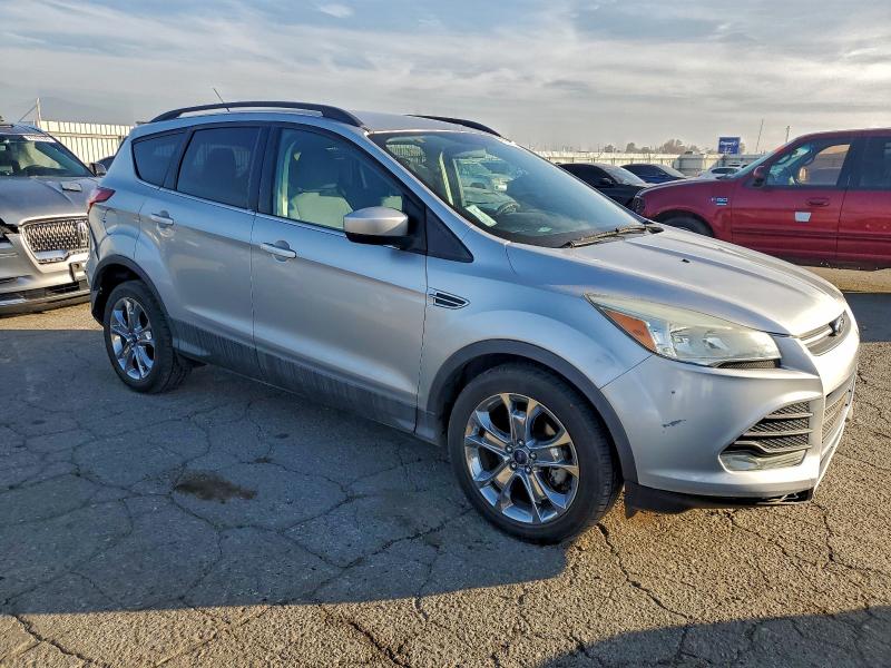 Photo 4 from auction – 2015 FORD ESCAPE SE with VIN 1FMCU0GXXFUB07803