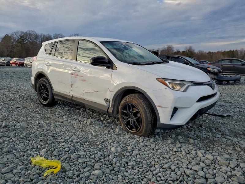 Photo 4 from auction – 2017 TOYOTA RAV4 LE with VIN 2T3BFREV6HW632895
