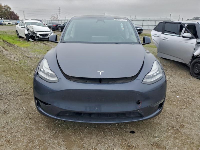 Photo 5 from auction – 2023 TESLA MODEL Y with VIN 7SAYGDEE7PA109657